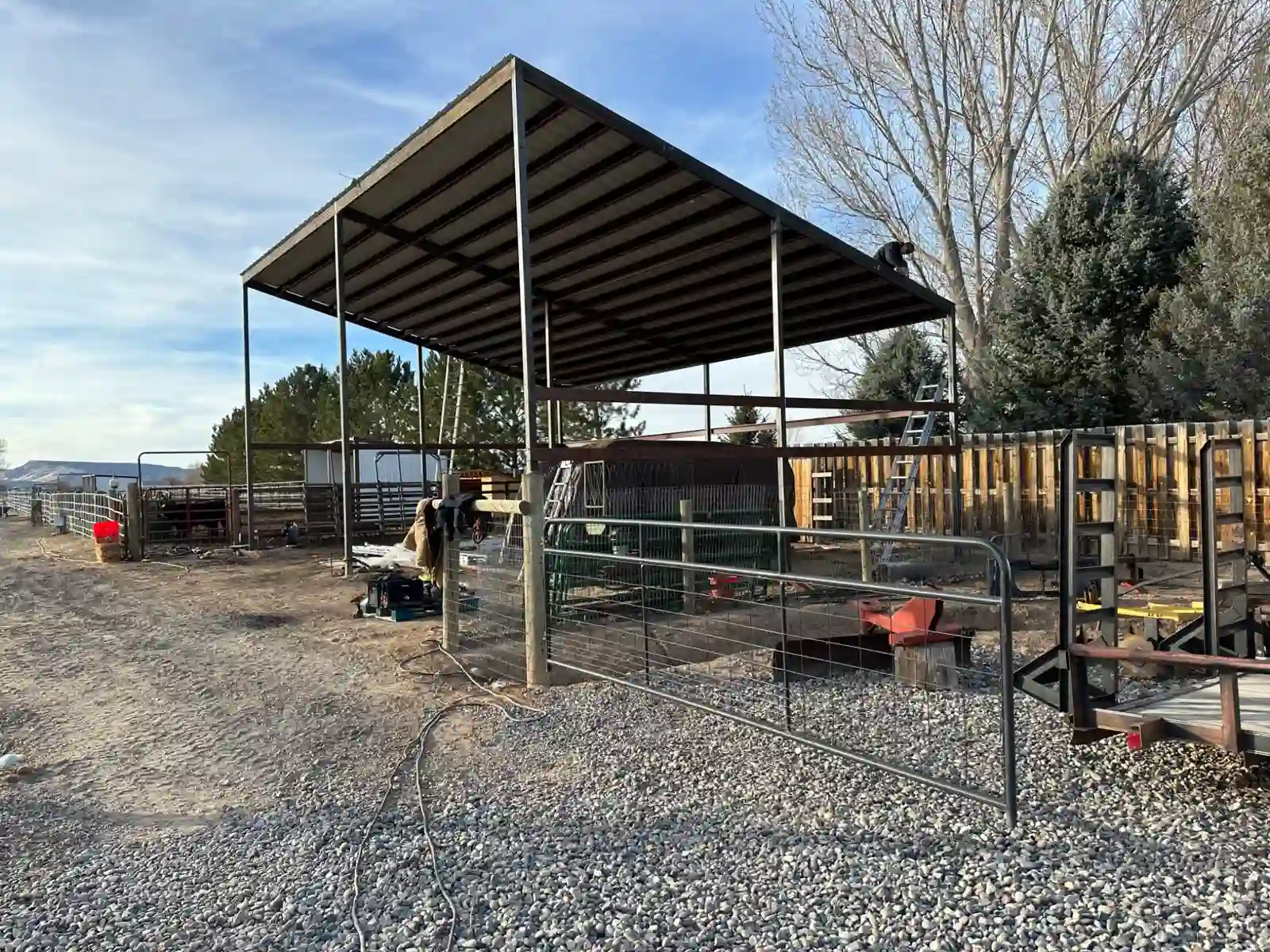 Large structural-steel hay shed under construction