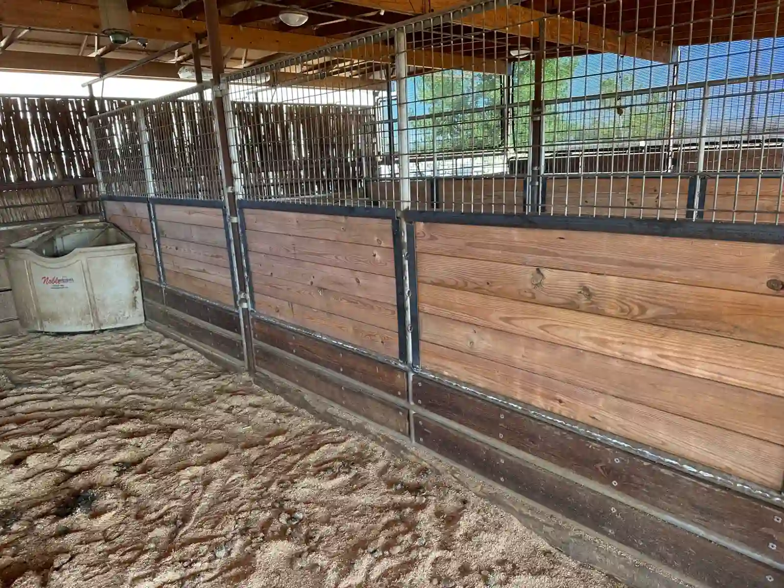 Horse stall panels modified with wood privacy infill